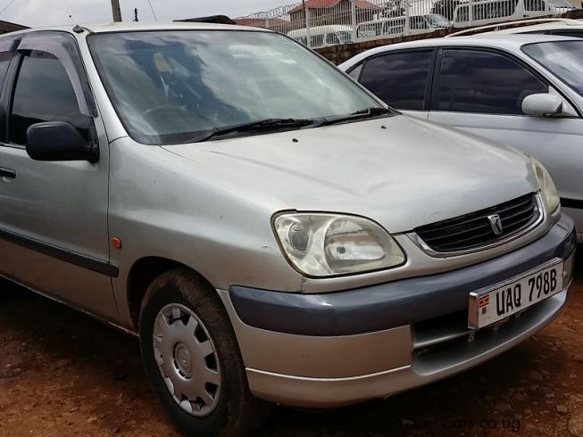 Toyota raum обвесы